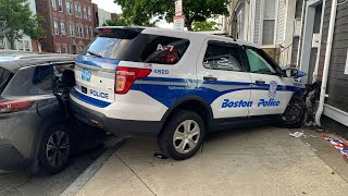 Police cruiser crashes into building that houses Boston barbershop