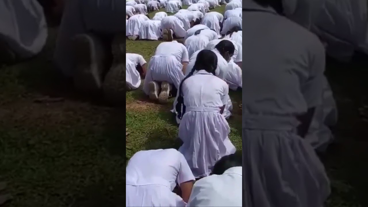 srilanka school  girls  kneel down and get blessings from a teacher who is retired from the school