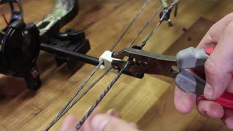 Removing a bowstring nock with Carbon Express Universal D-Loop Nock Pliers