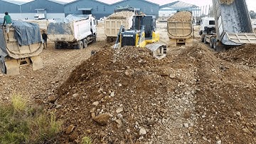 Nicely Landfill Work Use Heavy Dump Truck Unload Stones with SHANTUI DH17C3 Dozer Pushing into Water