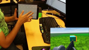 TabletInVR: Exploring the Design Space for Using a Multi-Touch Tablet in Virtual Reality