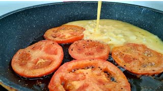 Pour eggs over the tomato for a delicious omelette recipe! Quick Breakfast in 5 minutes