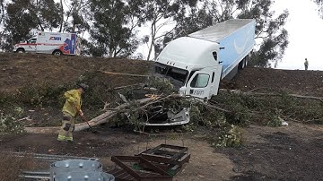 Amazon Semi Crashes on Wet Roads