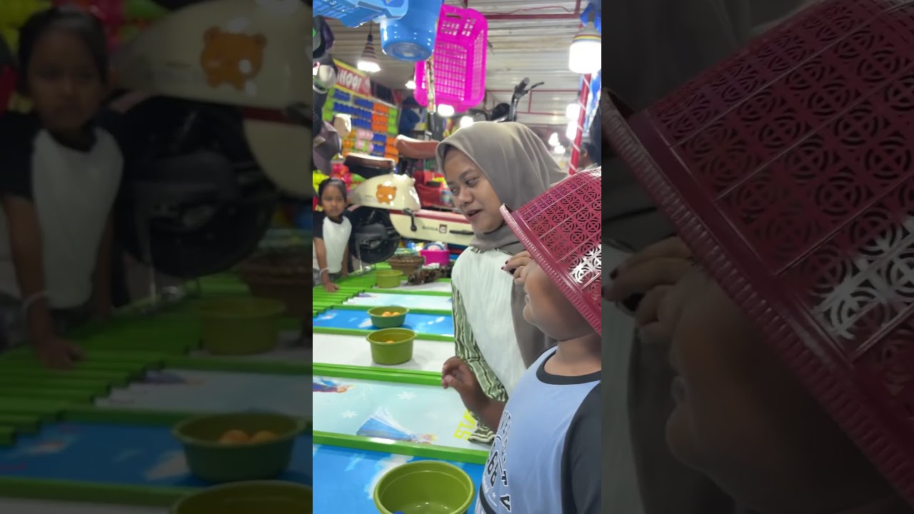 KETAGIHAN MAIN LEMPAR BOLA