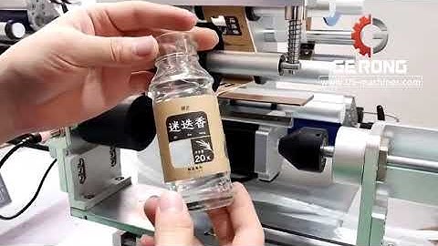 Small glass bottle customized bottle holder jig mold type labeling machine