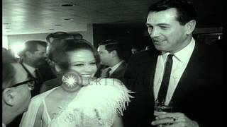 Milton Rackmil presents bouquet to actor and film maker Claudia Cardinale during ...HD Stock Footage Milton Rackmil presents bouquet to actor and film maker Claudia Cardinale during ...HD Stock Footage