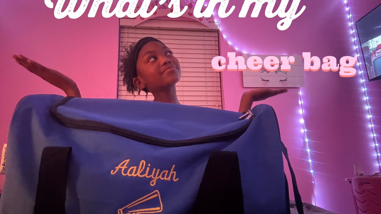 What’s in my cheer bag|| pom poms, cheer shoes, rain coat,etc!!