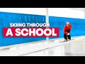 Freestyle skiing through a school