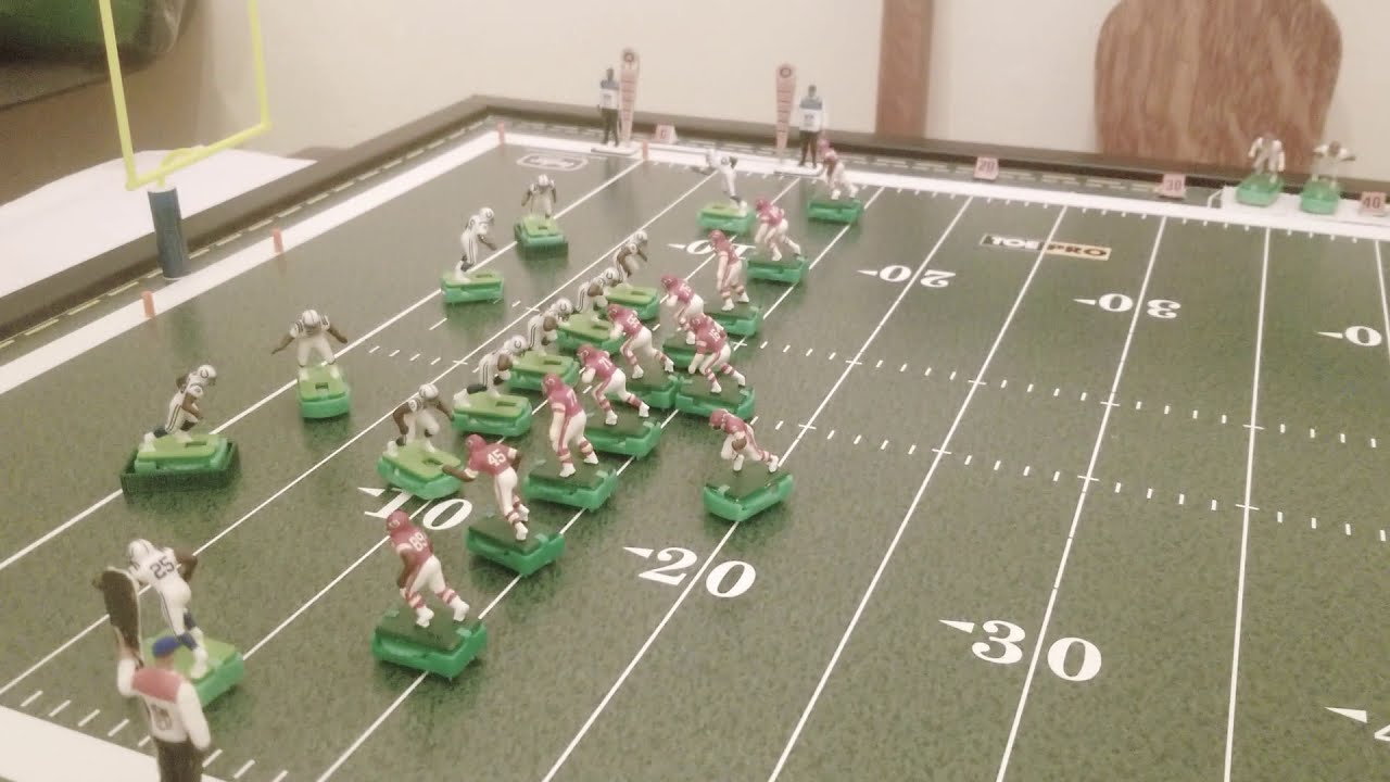 Mike Garrett finds 3 tough yards with both hands on the ball!