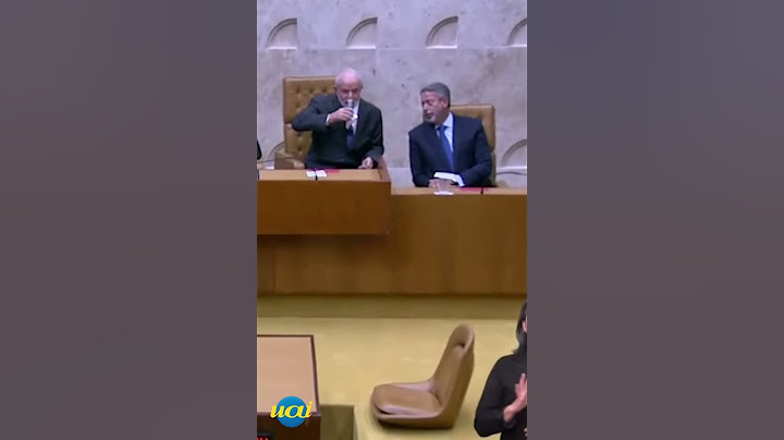 Lula e Lira conversam durante posse de Flávio Dino