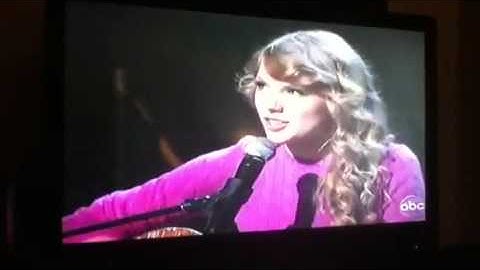 Taylor Swift performing Ours at the CMAs