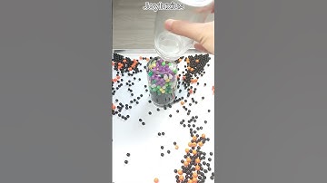 Rebuilding Tower of Orange, Black n Colorful Beads