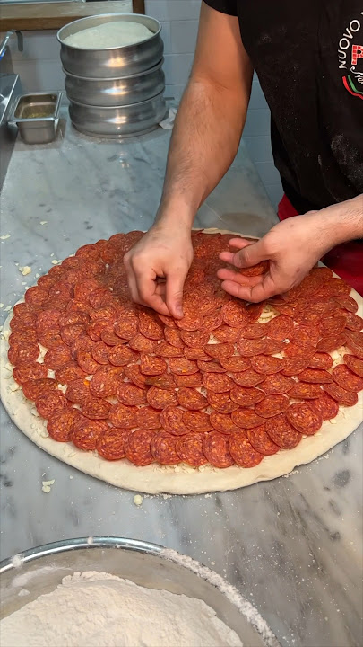 The PEPPERONI PESTO PIZZA from Nuovo York Pizza in NYC’s East Village! 🍕🗽🔥 SO GOOD. #DEVOURPOWER