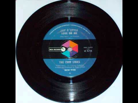 YouTube पर The Cuff Links - Lay a Little Love on me (B Side) देखें