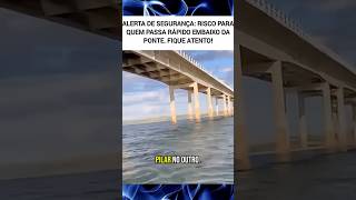 homem alerta perigo ao passar com embarcação por baixo da...