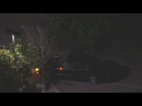 Police chase ends after driver crashes into parking lot barrier - YouTube