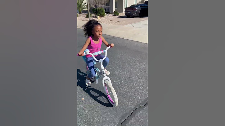 HER FIRST TIME RIDING A BIKE!