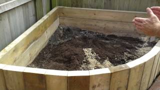 Raised Beds Using Timbers Installed In A Vertical Format. By positioning the timbers of a Raised Beds in a vertical format this will 