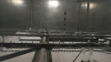 rake ice to discharge auger conveyor