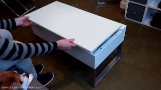 A condo sized mini coffee table with a lifting glass top. We show you a demo of this smart storage coffee table. Lift up the top and 