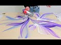 Youre in for a treat  purple perfection  fluid flower painting on raw canvas with spraypaint