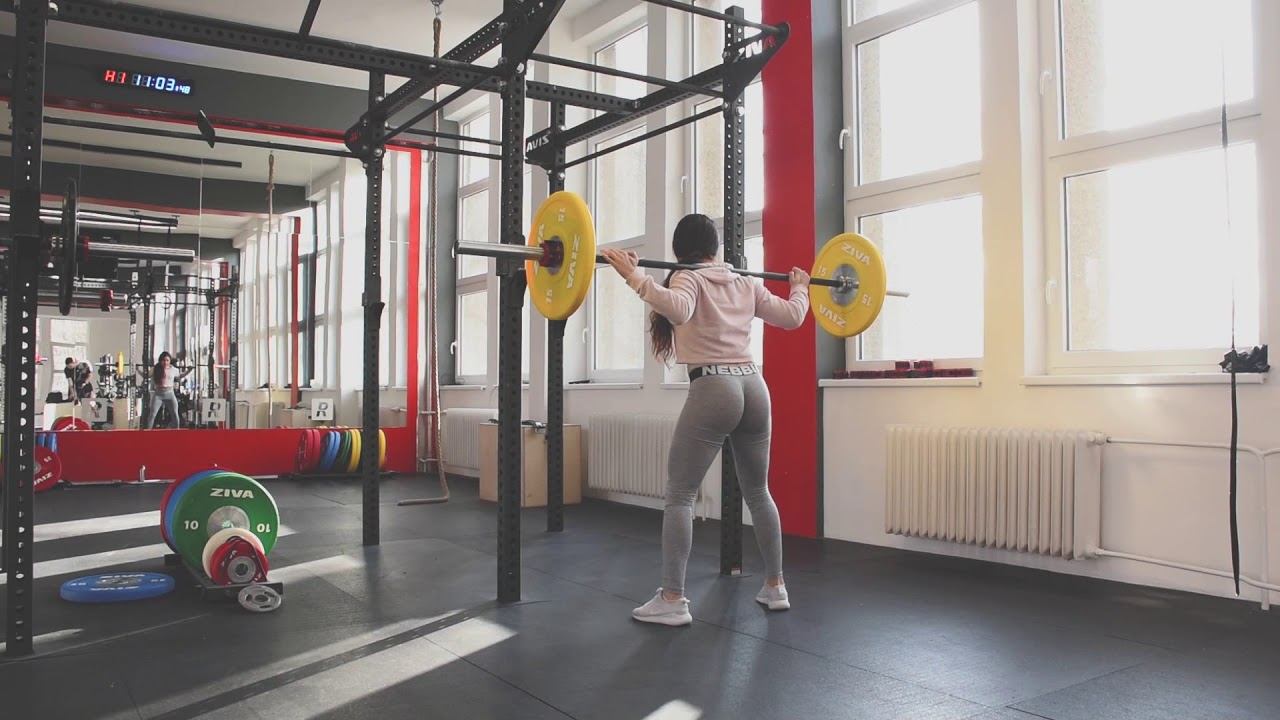 Silvie Sher squating