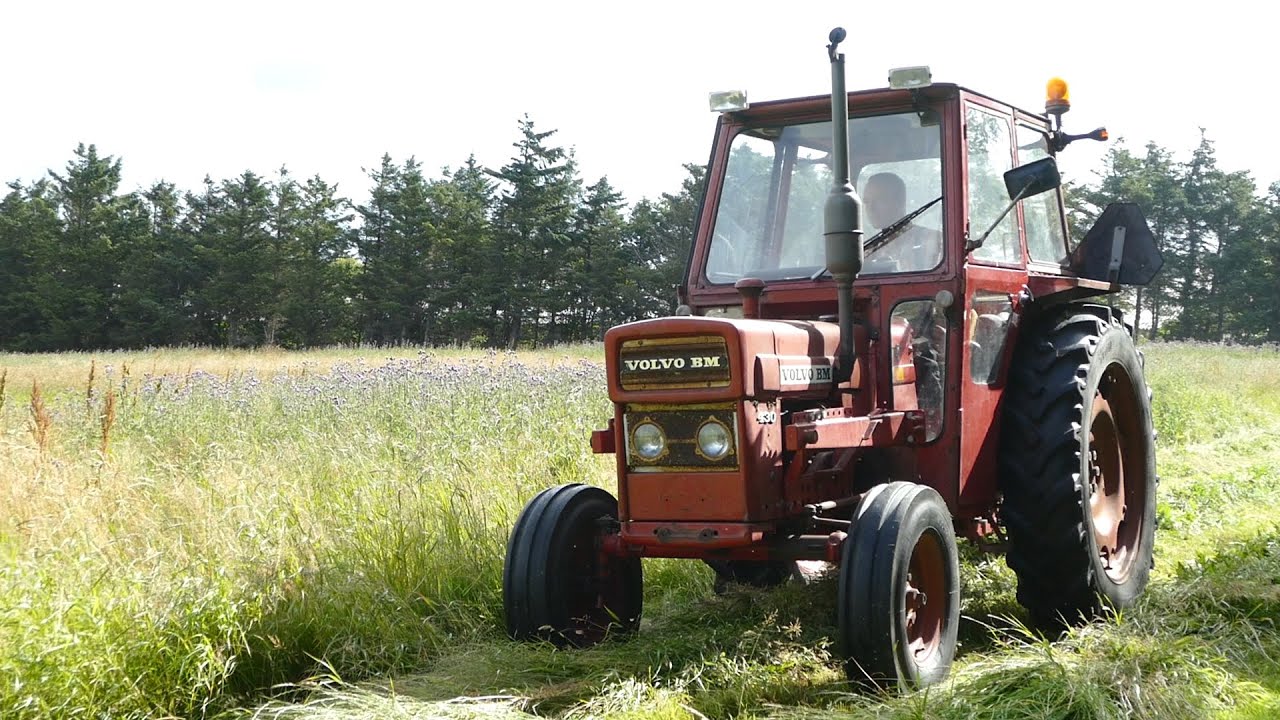 Volvo BM 430 in the field cutting grass w/ Fransgård TR165 Drum Mower | DK Agriculture
