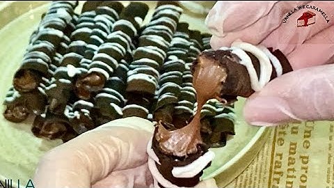 ويفر  الشيكولاتة رولز بدون بيض او زبدة بسيطة جدا و سريعة و طعمها خياااالي 😋🍫