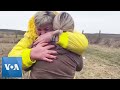 Ukrainian Mothers Hug and Cry as Children Handed Over at Border
