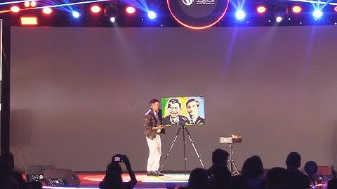 vẽ tranh trình diễn tranh nước và lửa - Nghệ sĩ Kỷ lục gia Nguyễn Tiến