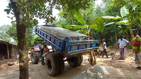 Video of loading and unloading digital hydraulic facility method river sand point clay & soil road