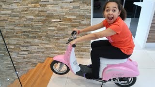 surprise toy unboxing assembling power wheels ride on bike toys andme