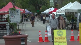 Shoppers Visit Farmers Market Before Rain Returns, Cleanup from Monday’s Storm Continues