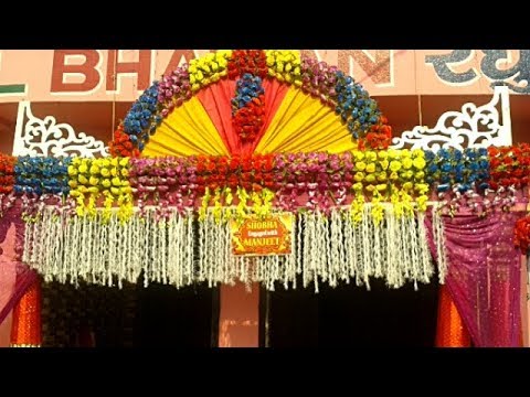 welcome-gate-decoration-with-multicolour-artificial-flowers-&-tuberose-chains-for-a-wedding-party