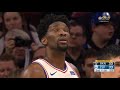 Joel embiid karate chops quincy acy in the face