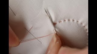 Finishing quilting with a popped knot