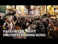 Tear gas fired as Hong Kong protesters gather in downtown Hong Kong on Halloween night