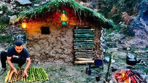 Building complete and warm survival shelter | Bushcraft earth hut, grass roof & fireplace