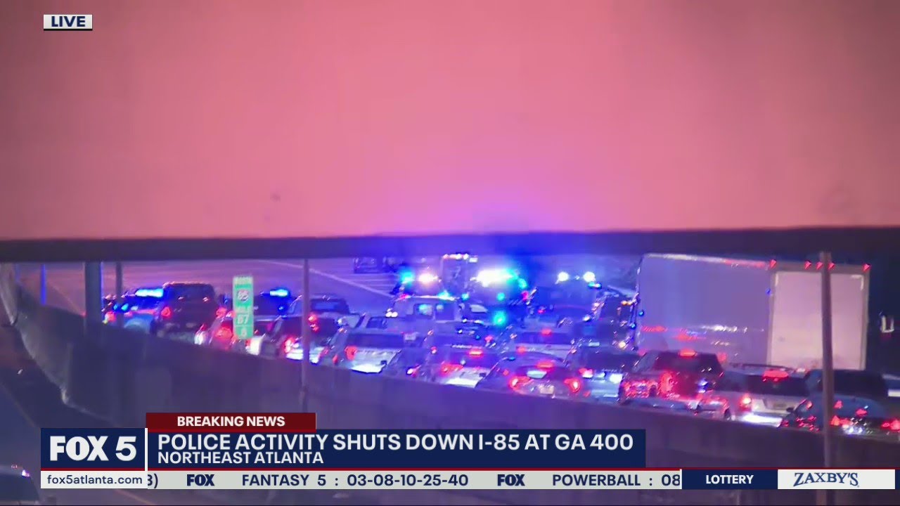 Heavy police activity shuts down Interstate 85 - YouTube