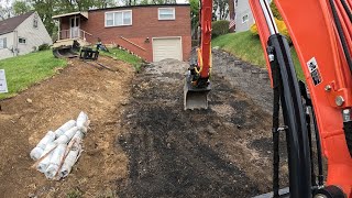 KX057-5 with Engcon EC206 tearing out old driveway and loading RAM 5500 dump truck (part 3)