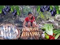 Survival cooking in forest: Shrimp salad Hot chili sauce and Wild black grape for food in jungle