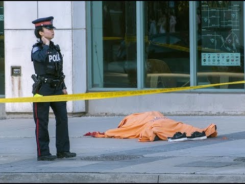 Gunman kills 2, wounds 12 others in Toronto before being shot dead by police