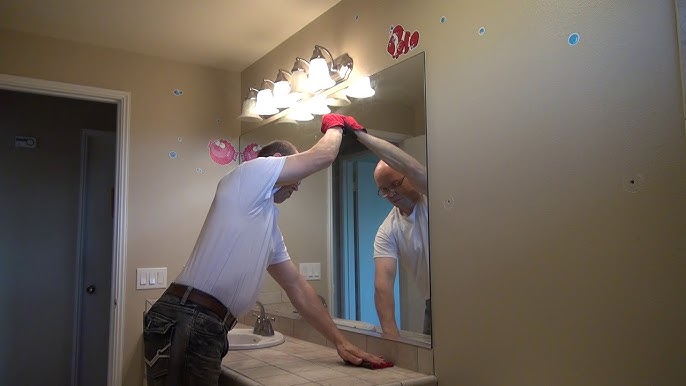 Removing a cheap mirror glued to the wall, only to find an even cheaper  mirror glued to the wall beneath it. : r/mildlyinfuriating