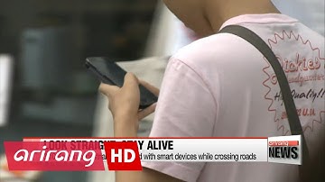 Pedestrians checking smartphones on the go exposed to increased risk of accidents