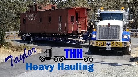 Taylor Heavy Hauling Moving a Caboose