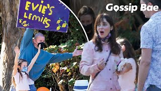 Actor Channing Tatum & daughter Everly sell lemonade & even even actress Zooey Deschanel dropped by!