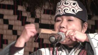 Ainu lady playing the Mukkuri