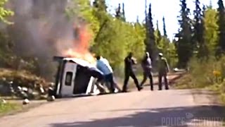 Police Dashcam Shows Dramatic Rescue Of Man From Burning SUV