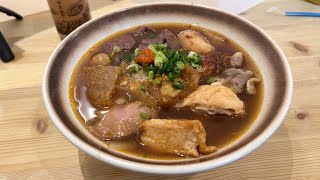 Hong Kong Street Food. Untraditional Cart Noodles. Pork Intestine, Pork blood curd, Fish ball.