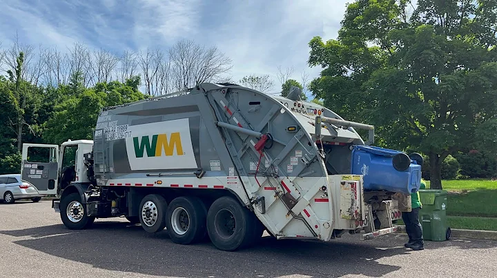 Ex Advanced Disposal Mack MRU McNeilus rear loader garbage truck